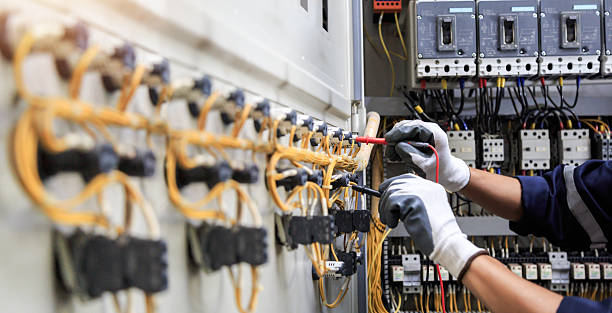 Professional Electrical Panel Upgrade technician working in Franklin County County, IA